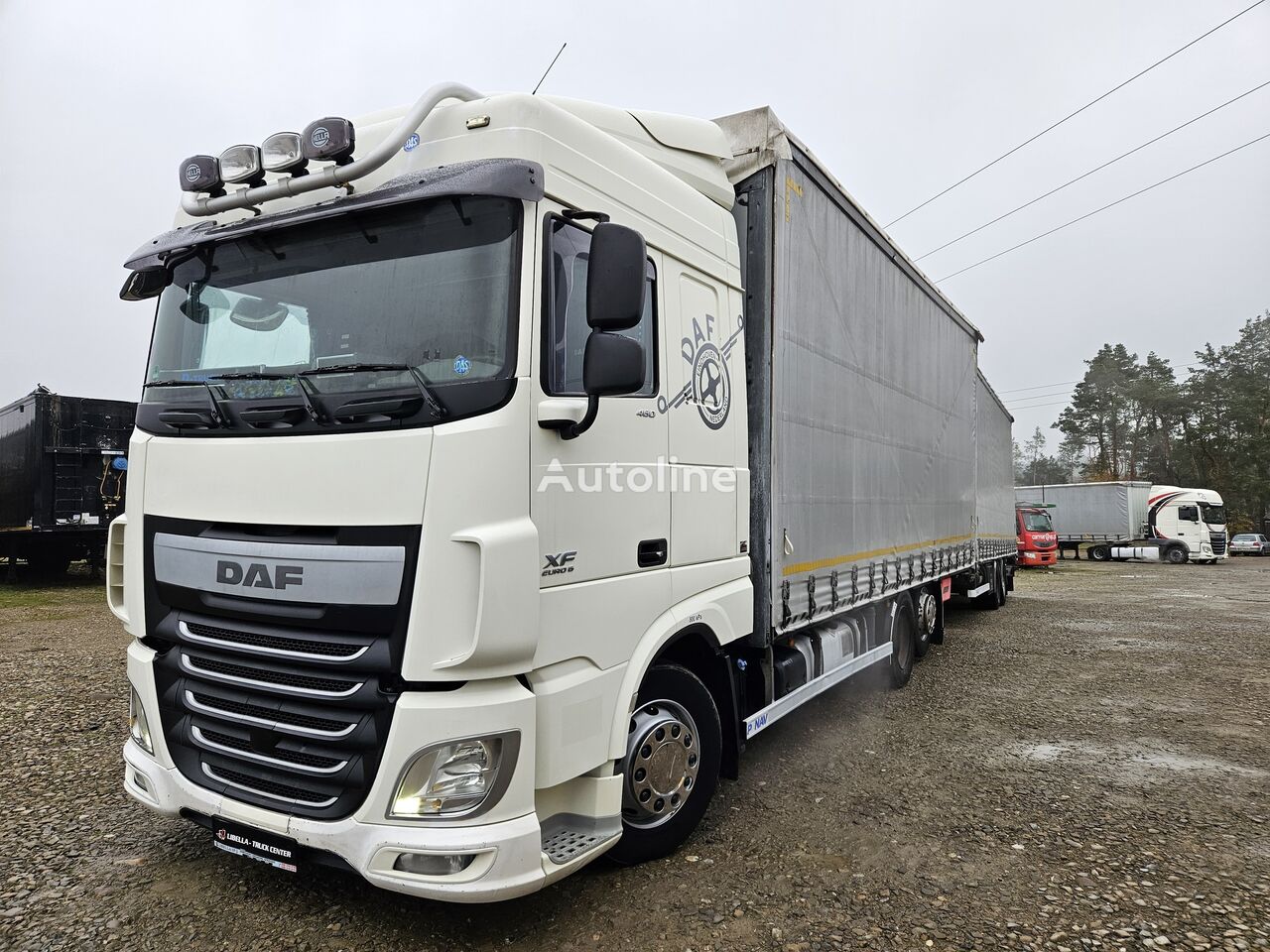 Ciężarówka firanka DAF XF 106 460 6X2 PRZEJAZDOWY ZESTAW 120m3 na